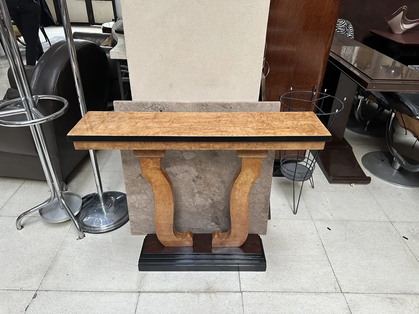 two elegant antique consoles with decorative shape