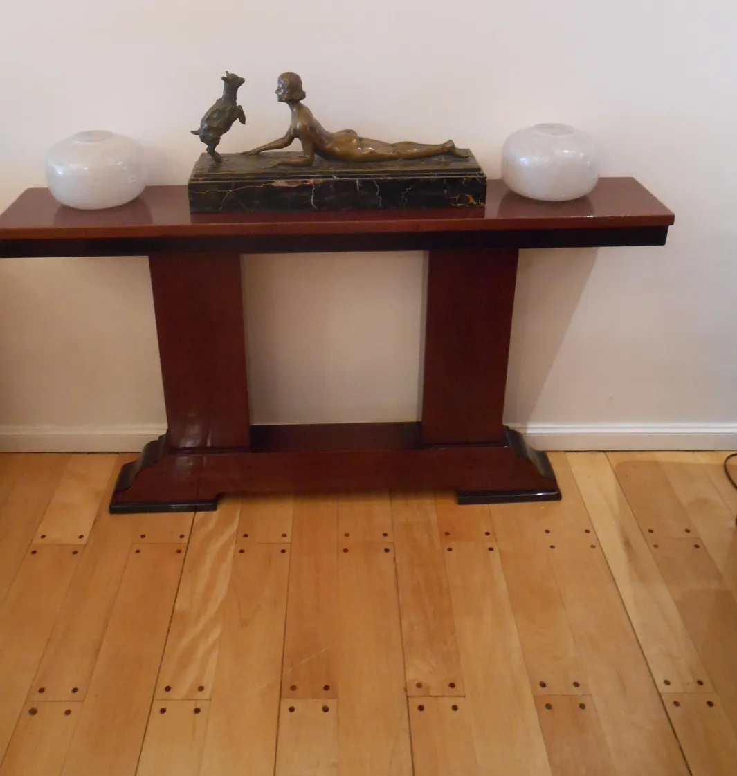Antique decorative consoles with sculpture and vases