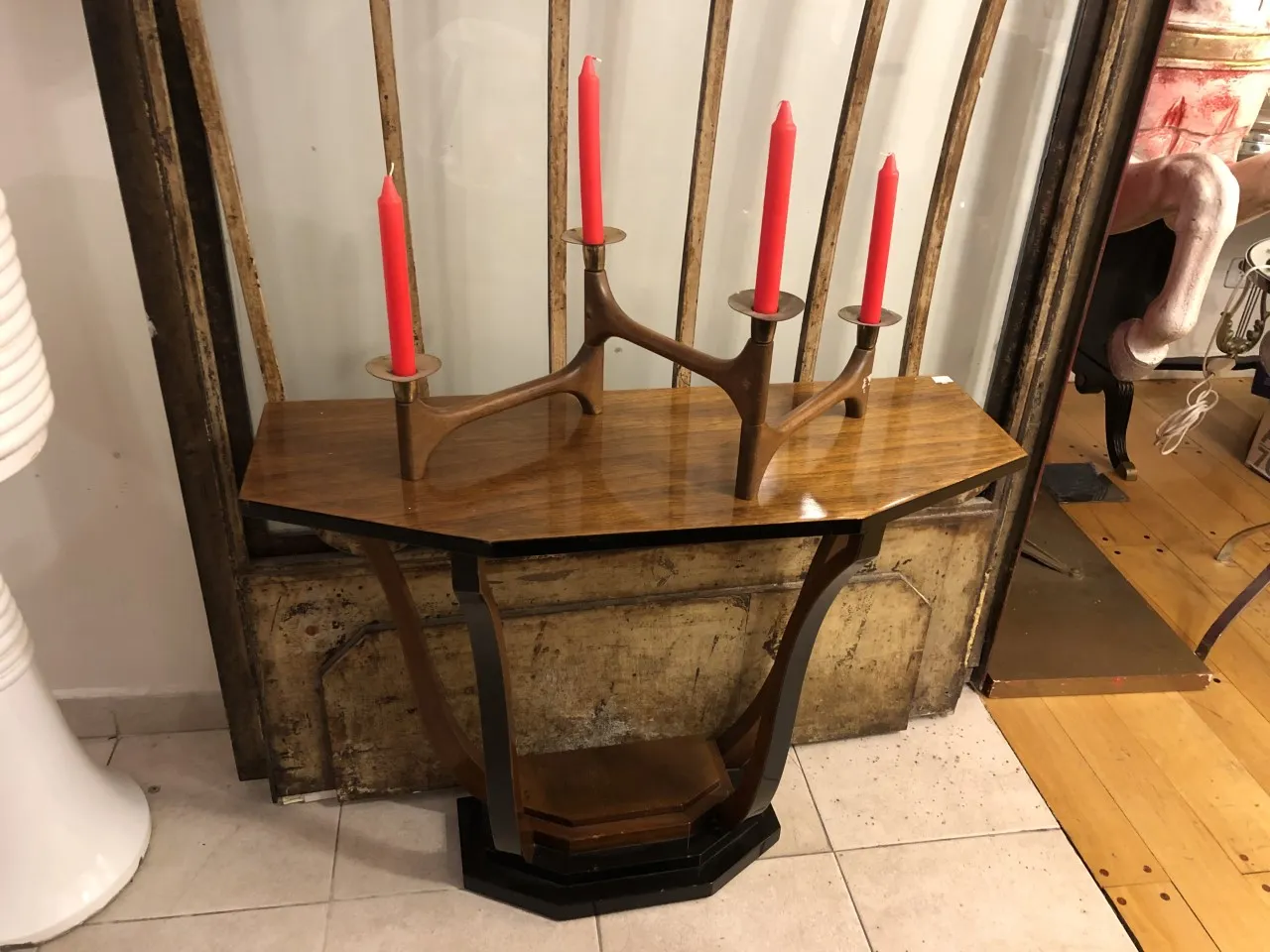 elegant antique candelabra with decorative red candles in a cozy setting