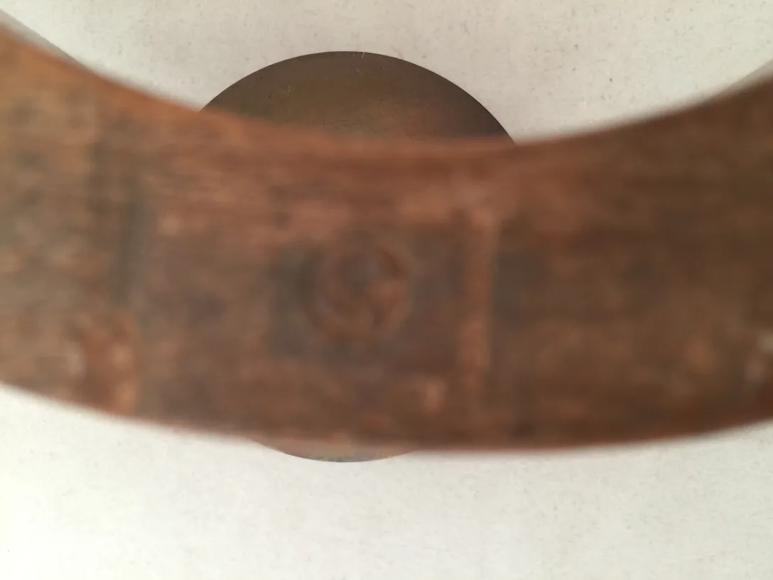 antique candelabra with detailed design in neutral setting