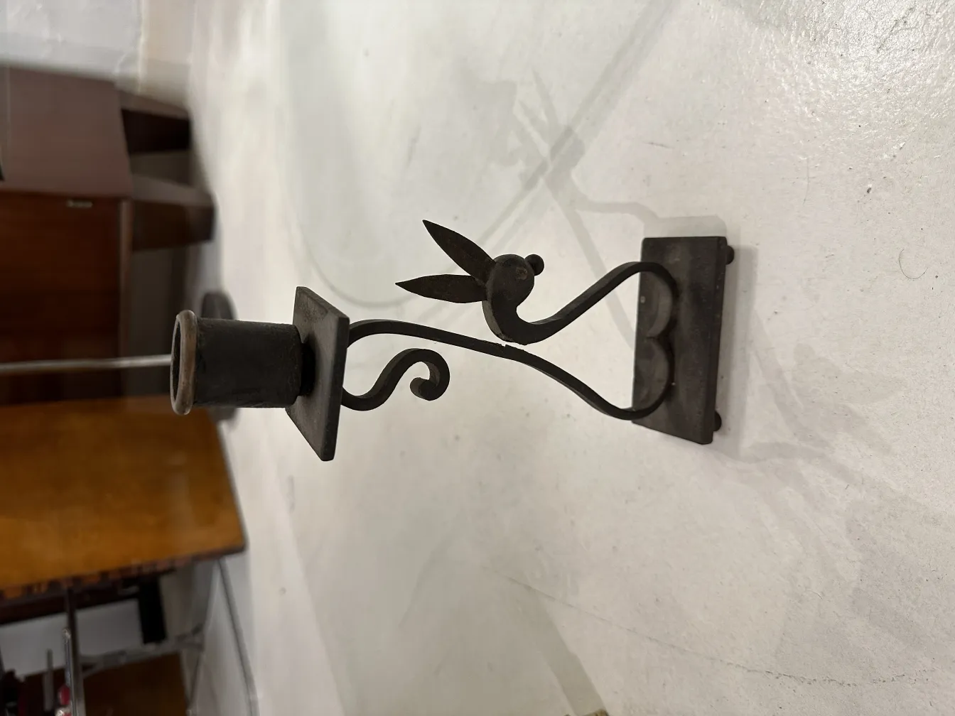 antique candelabra featuring decorative shape and elegant details, in a subdued setting