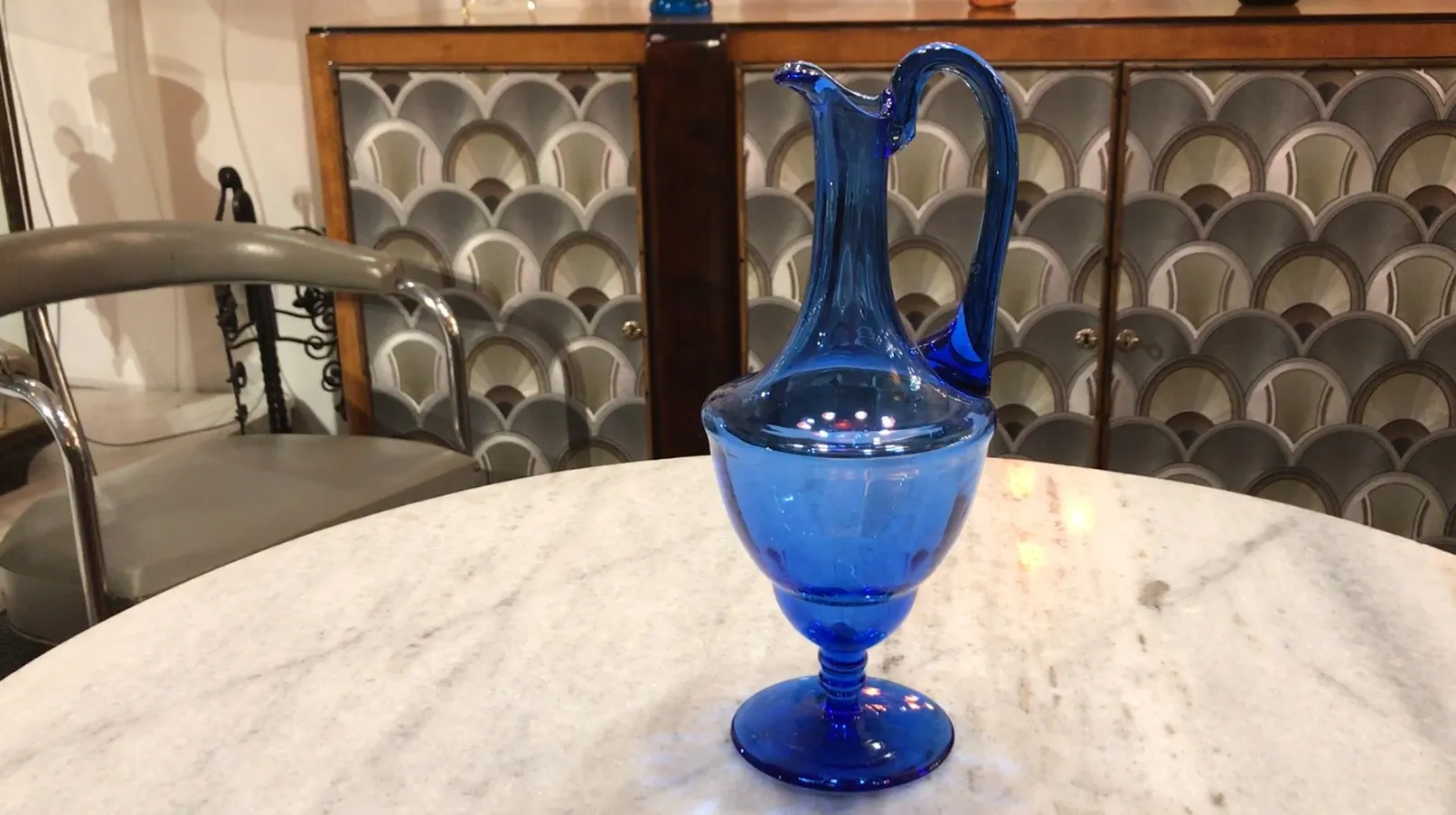 antique blue jar on marble table