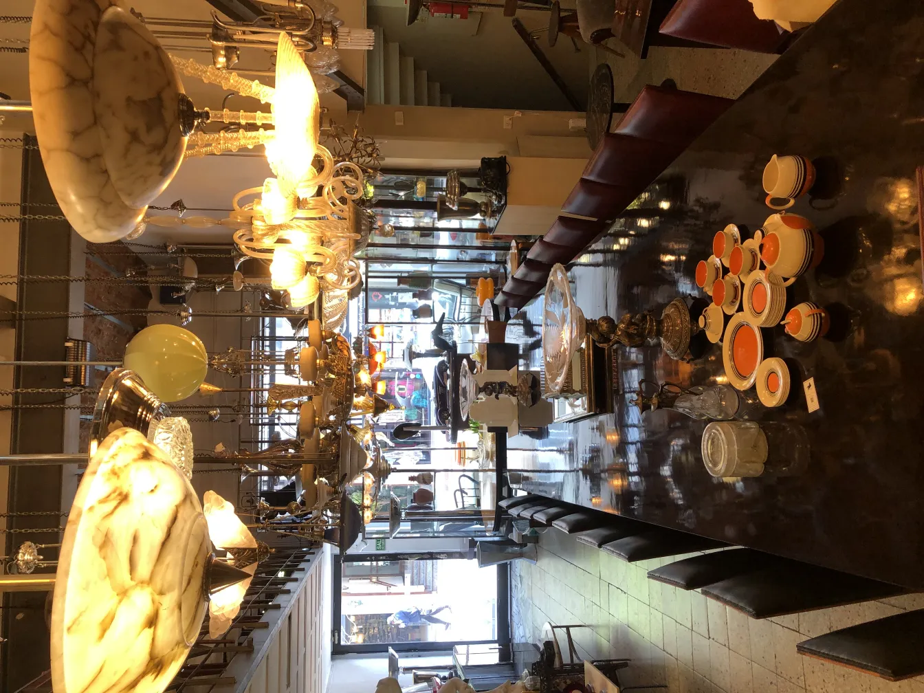 Antique tea set featuring vibrant colors and decorative plates.