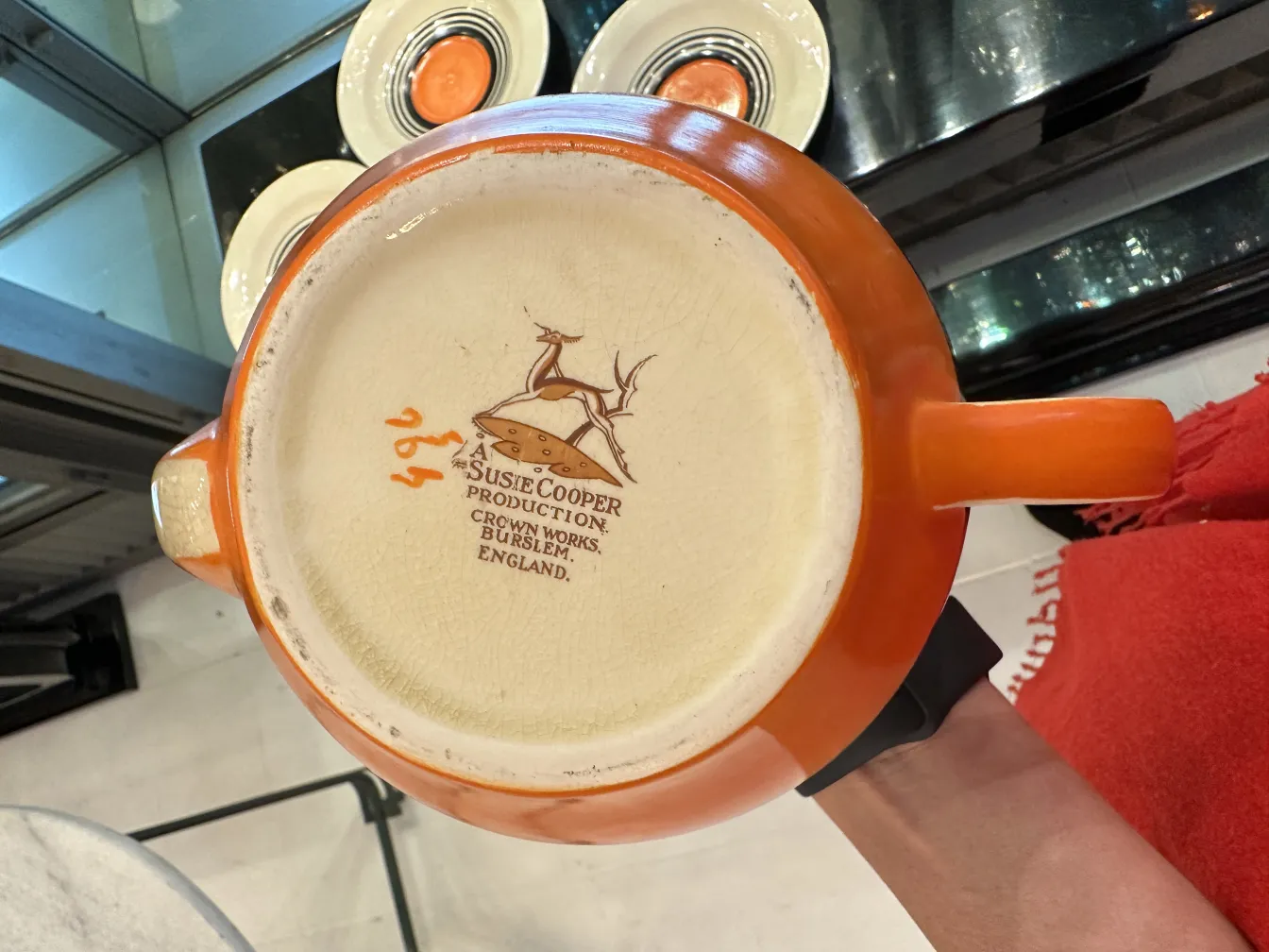 antique orange tea set on a light background