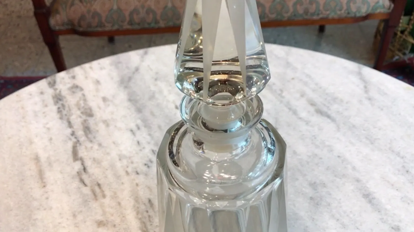 antique decorative bottle with clear design, light background