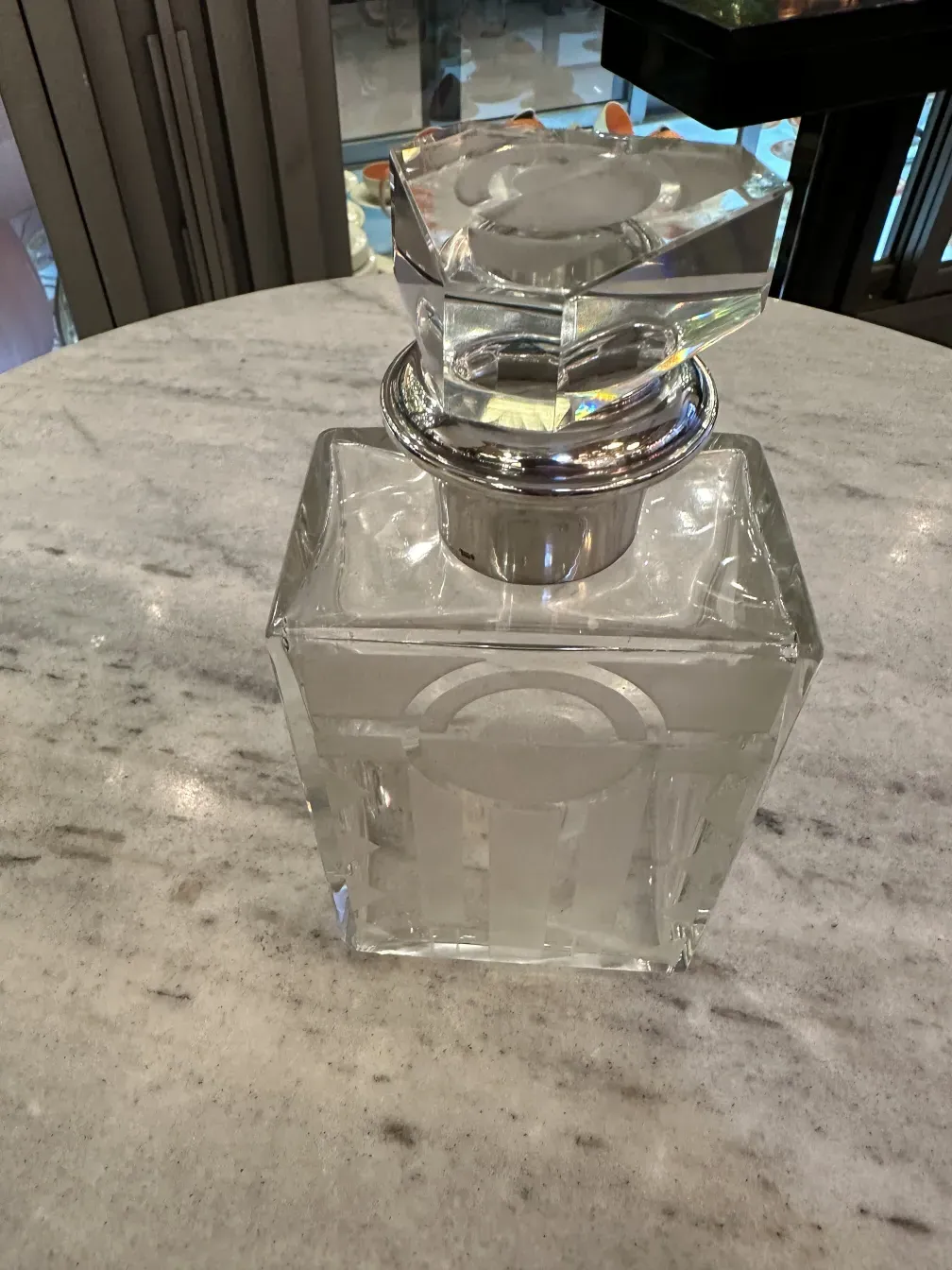 antique glass bottle with decorative lid