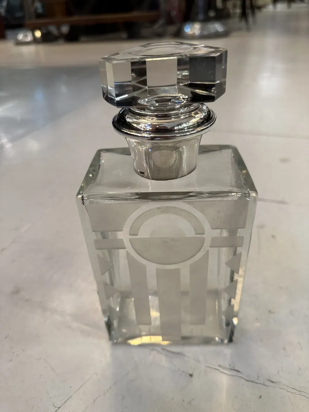 antique glass bottle with decorative details