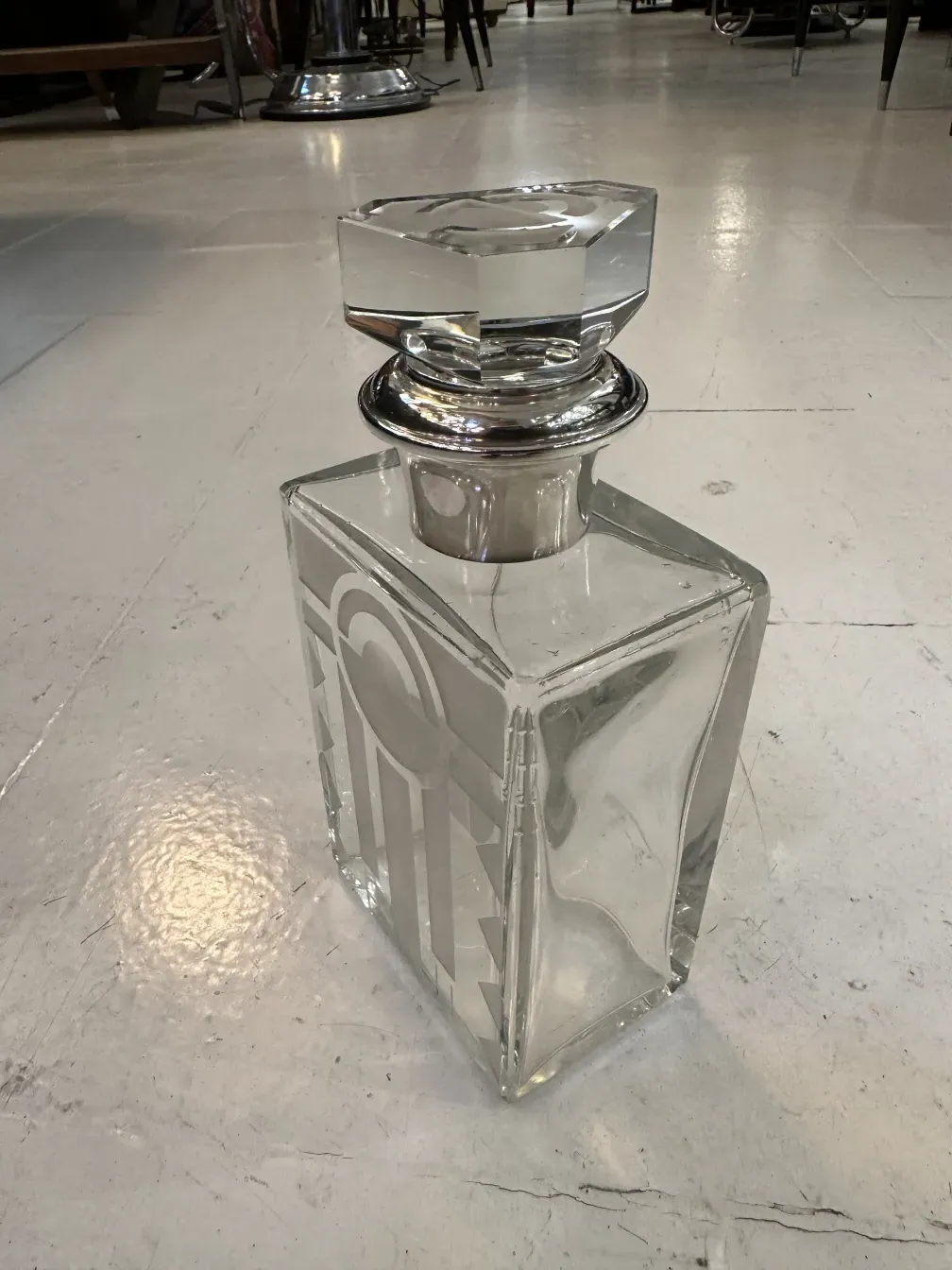 antique glass bottle with decorative lid