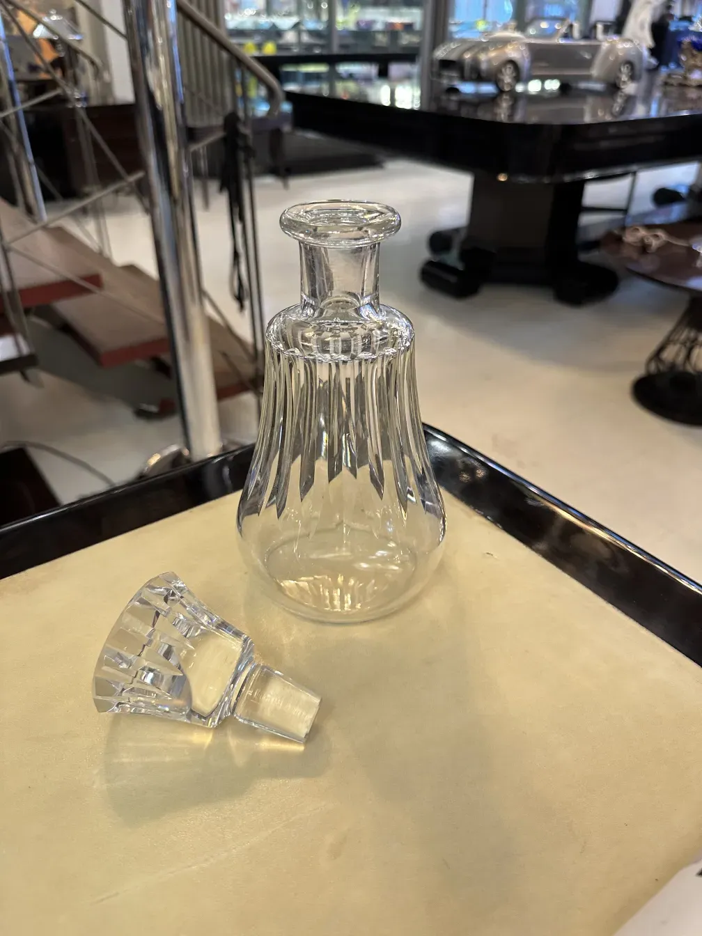 antique bottle with ribbed design and stopper