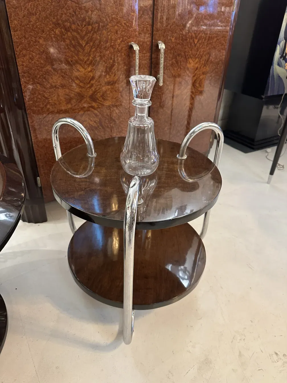 antique bottle on a stand in a stylish setting