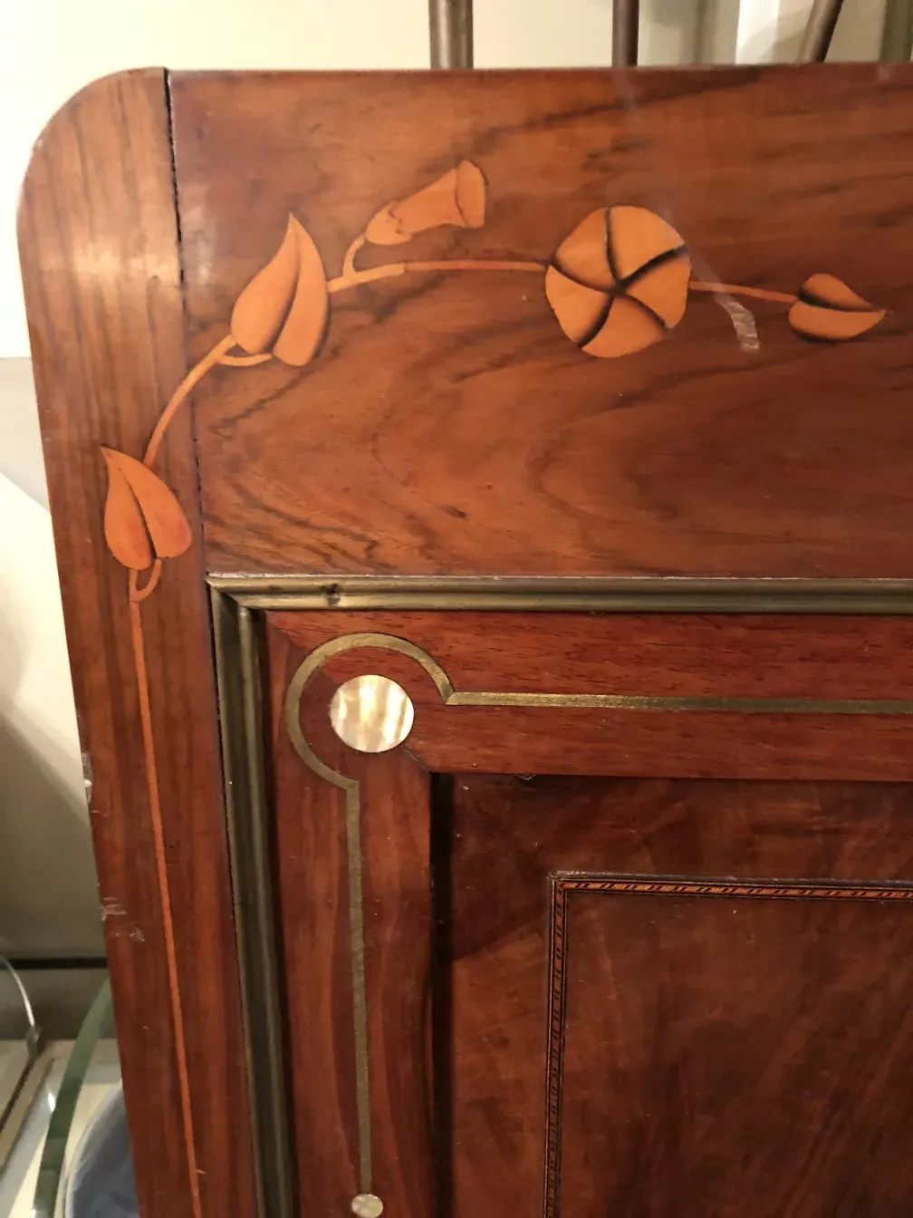 Antique bed with decorative design and flowers