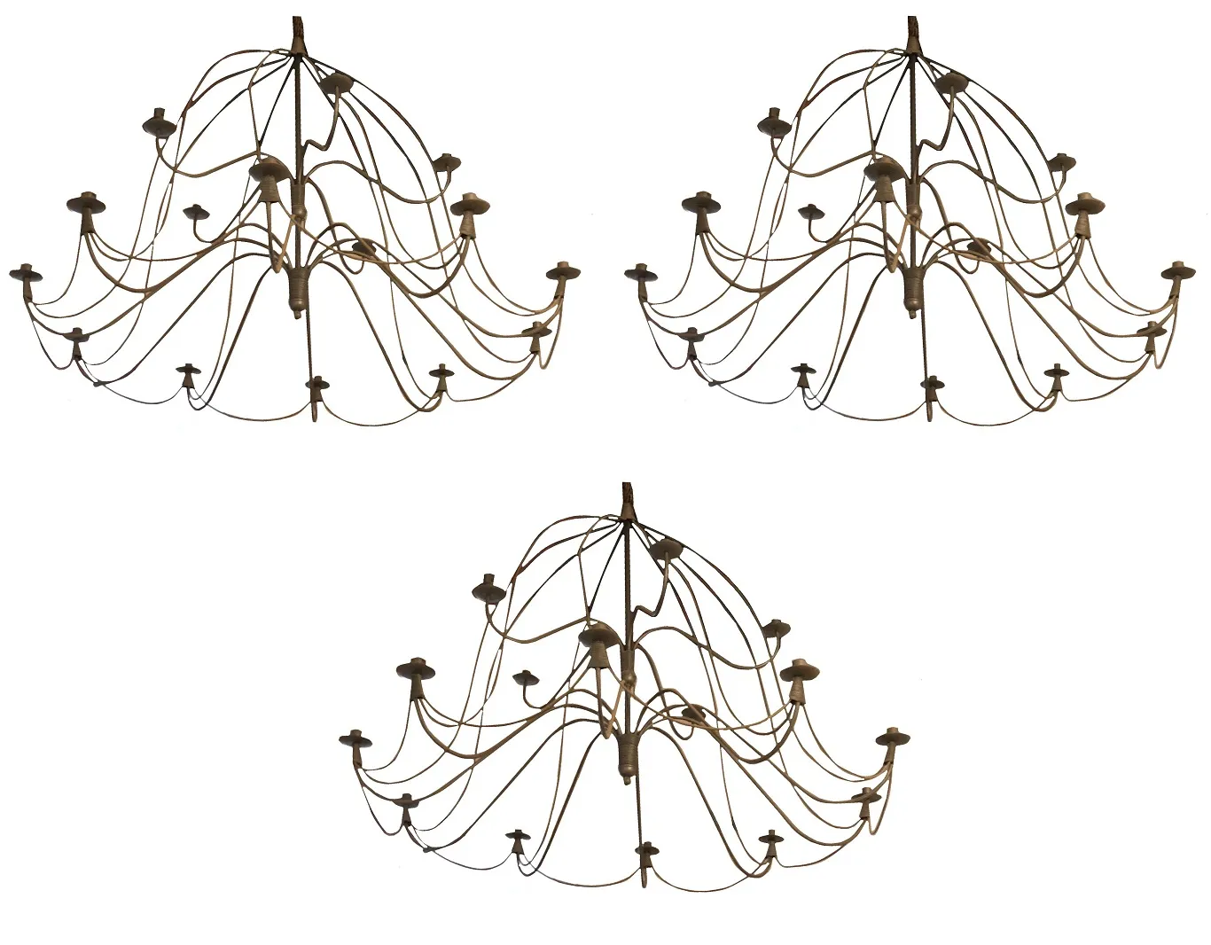 Tre lampade a sospensione antiche con un design elegante e decorativo in un contesto classico.