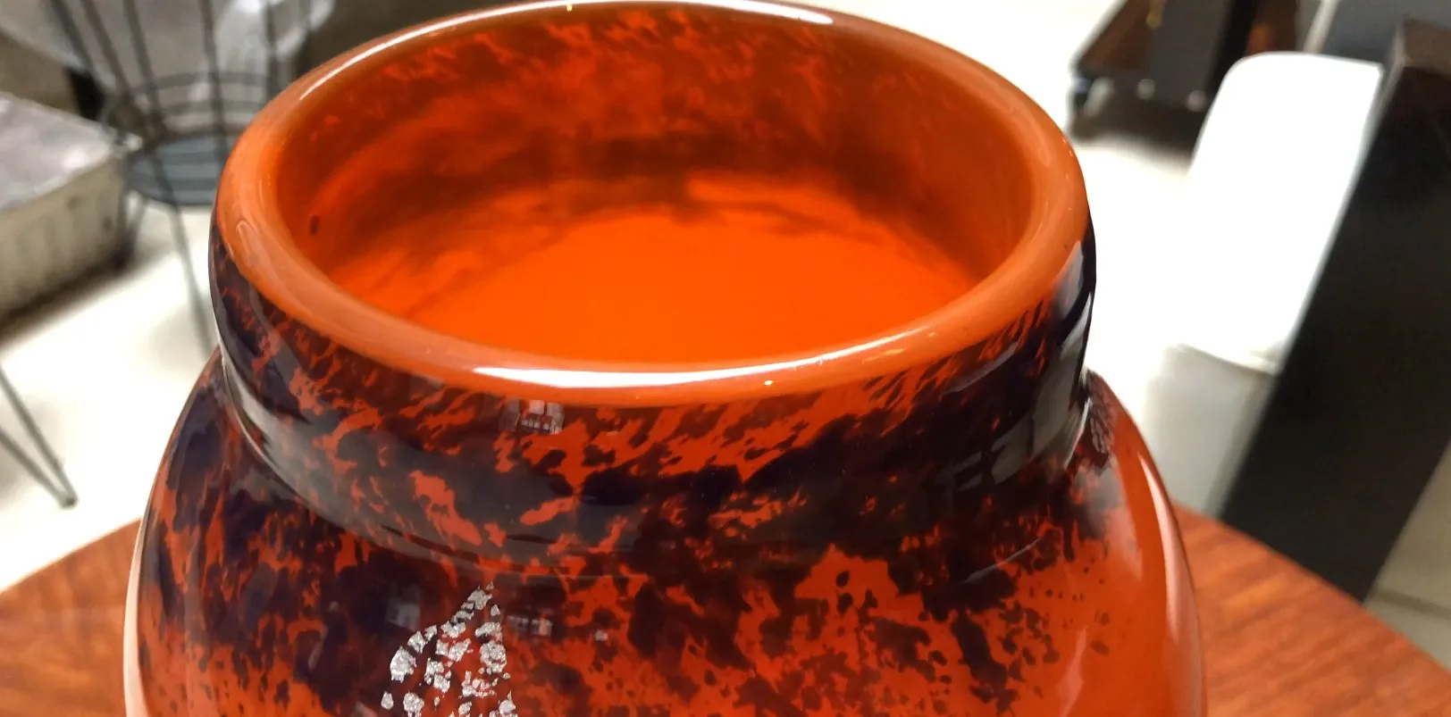 Antique glass signed by Muller Fres featuring a distinctive and colorful design, creating a unique visual appeal in an elegant setting.