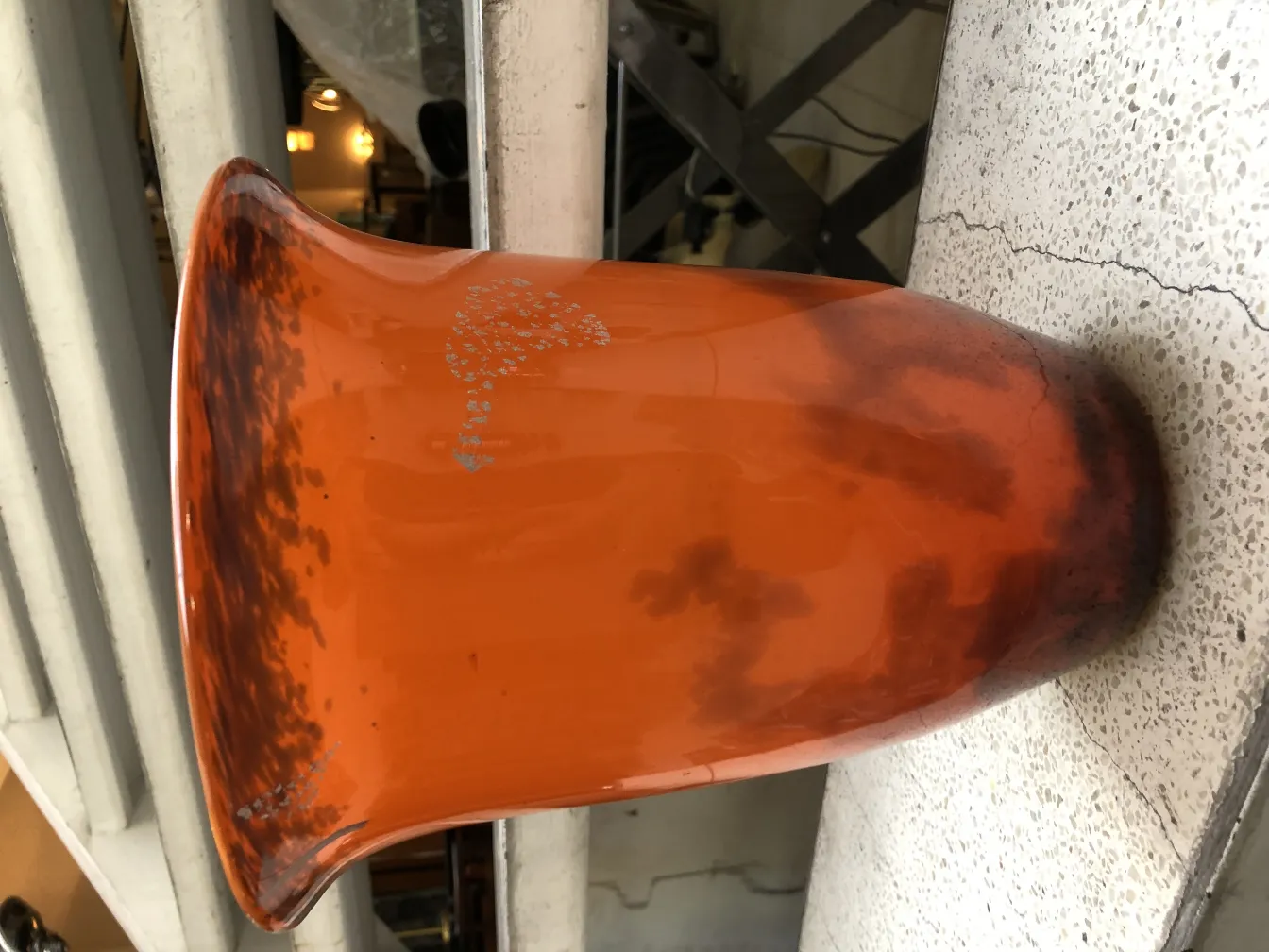 Antique piece with muller freres signature, bright orange, classic design.