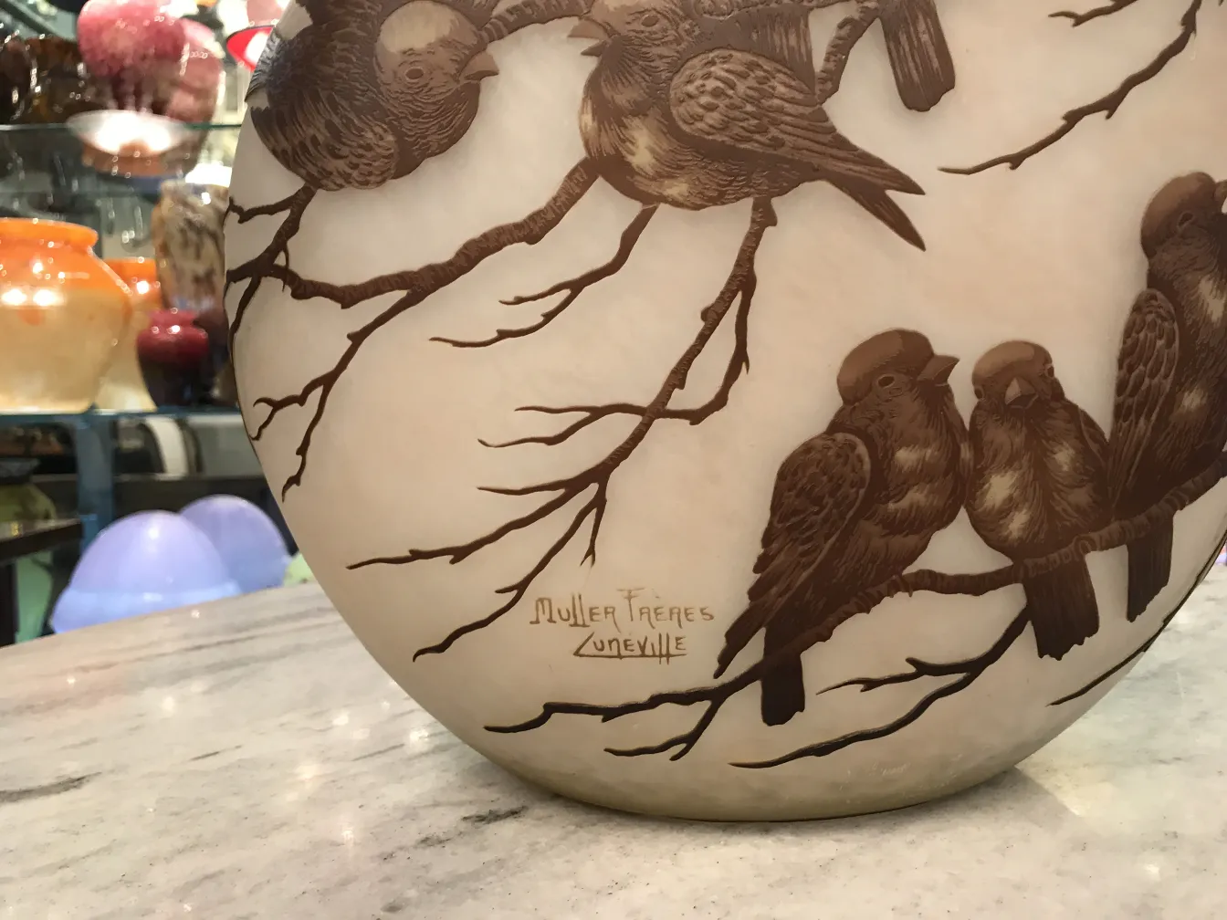 Signed glass Muller Freres with bird decoration on branches