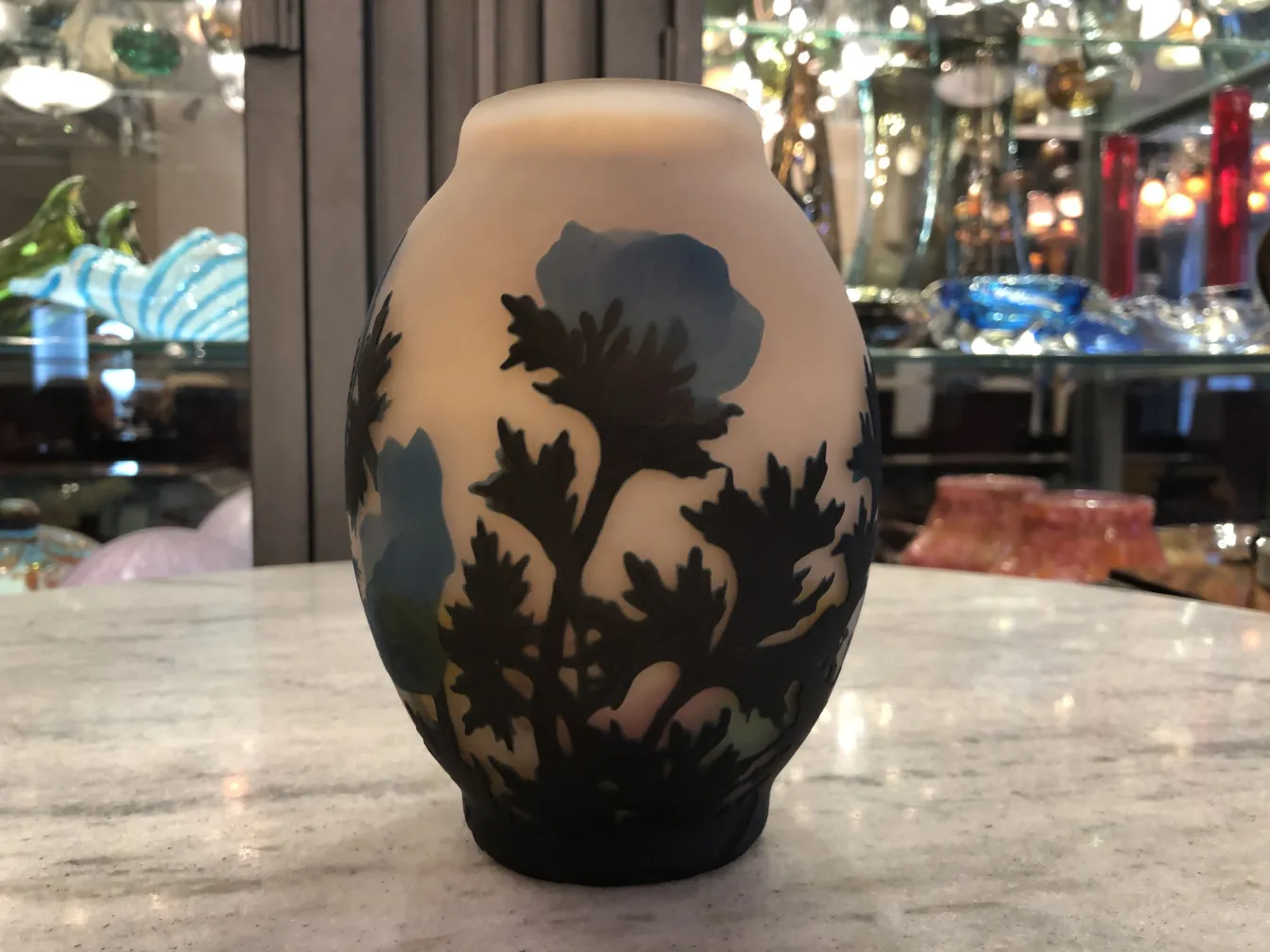 Antique signed glass by Muller Fres featuring floral patterns