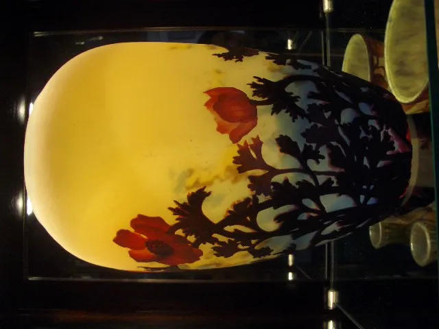 Antique glass vase signed Muller Freres with flowers