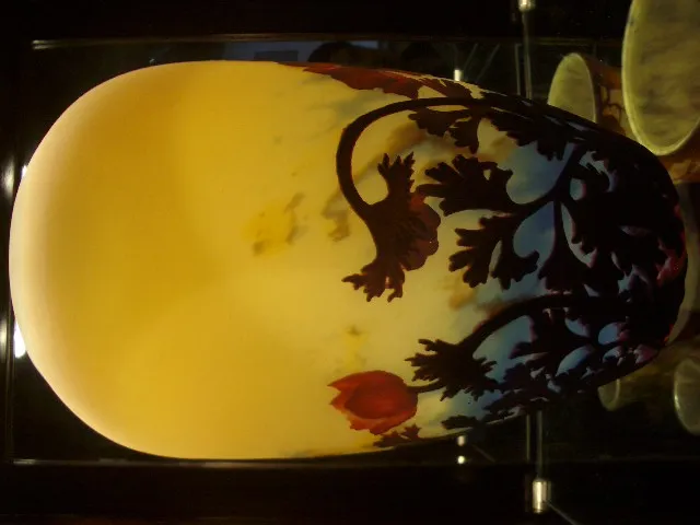 view of signed glass Muller Fres with floral design, antique atmosphere.