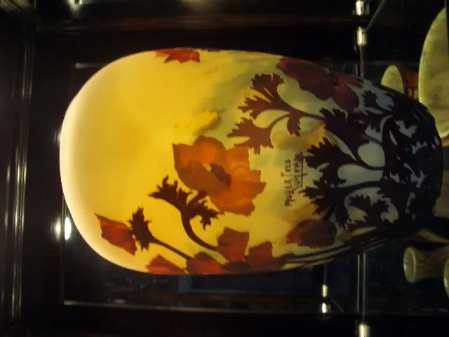 Antique signed glass Muller Fres, beautifully decorated with floral designs, perfect for collectors.