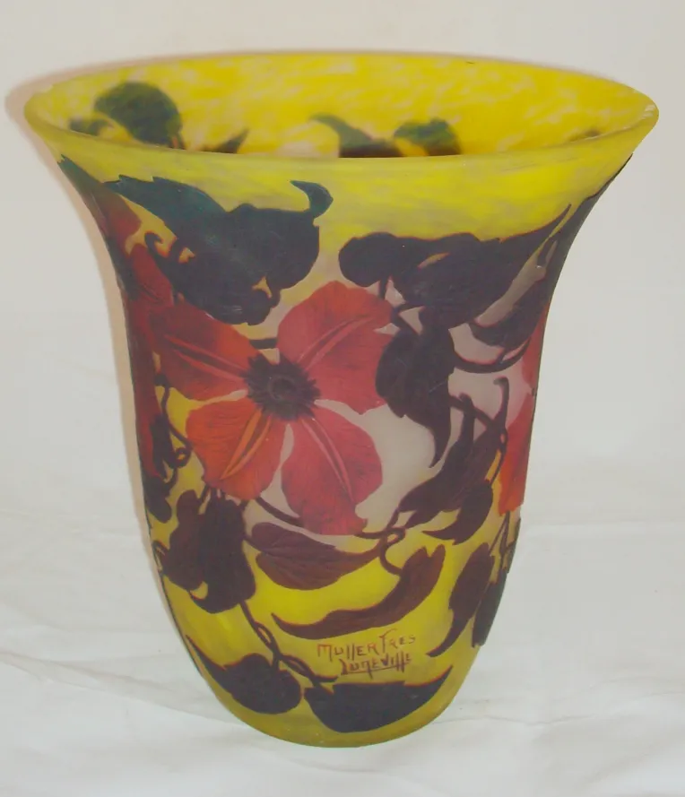 Antique signed glass by Muller Fres featuring vibrant floral decorations