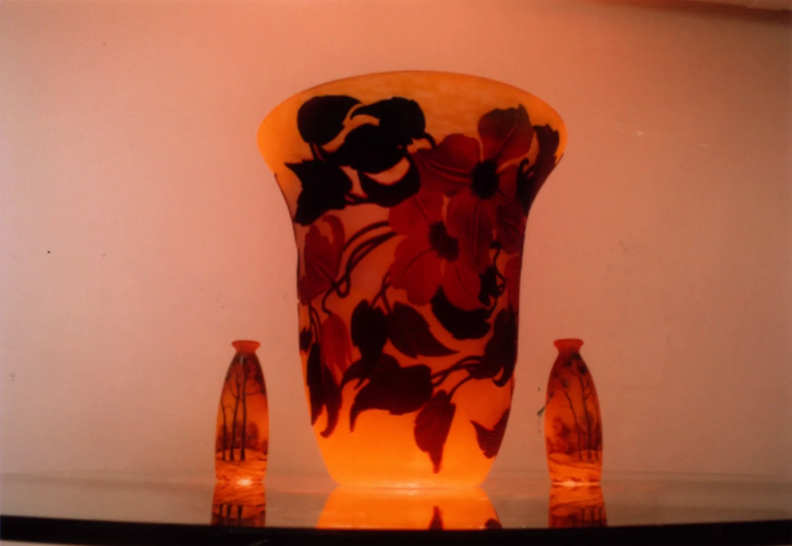 Antique signed glass by Muller Fres, featuring floral designs. Includes small vases.