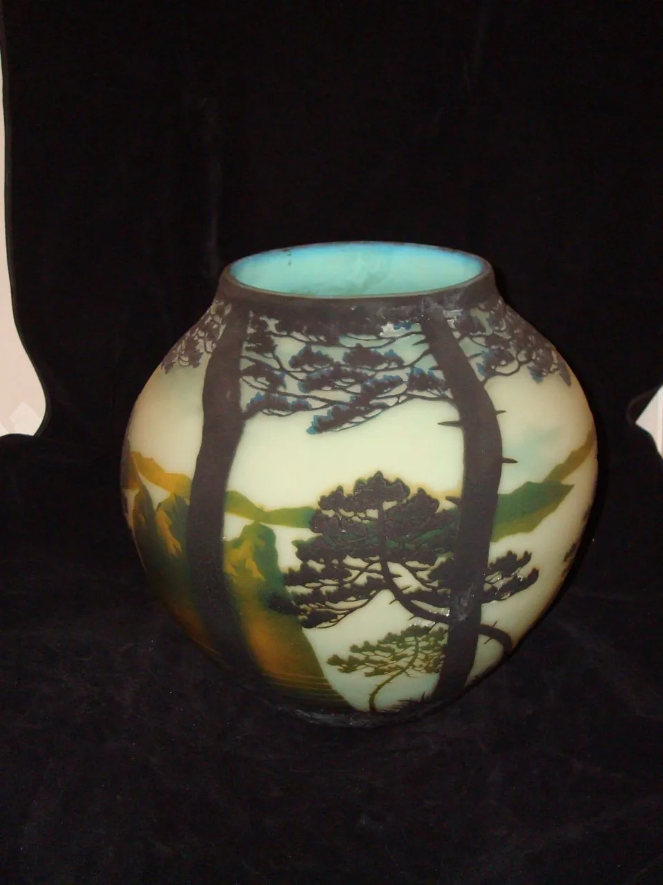 Beautiful signed glass by Muller Fres featuring landscapes.