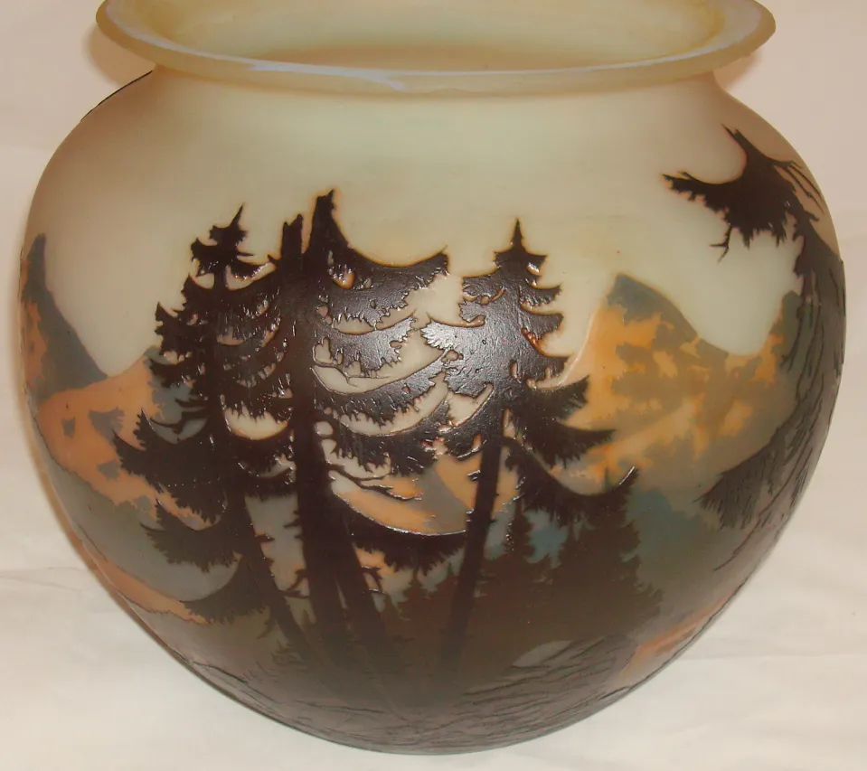 Glass featuring a nature scene with trees, signed Muller Fres.