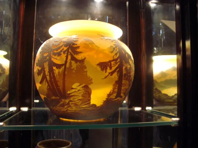 Antique signed glass featuring landscapes and trees by Muller Fres