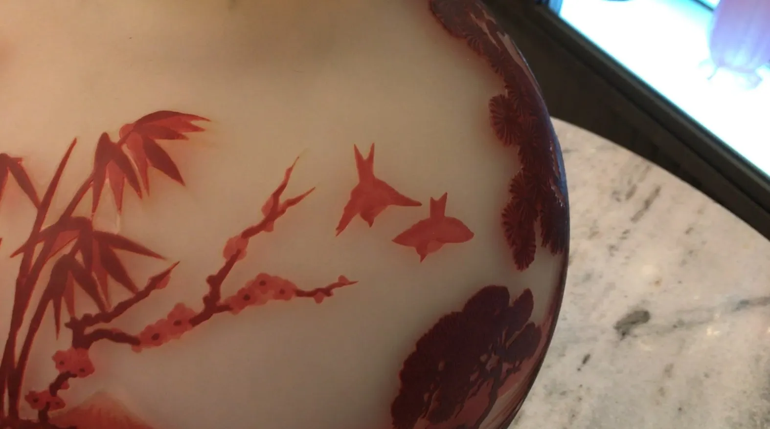 Antique signed glass by Muller Fres with clear nature designs in warm hues.