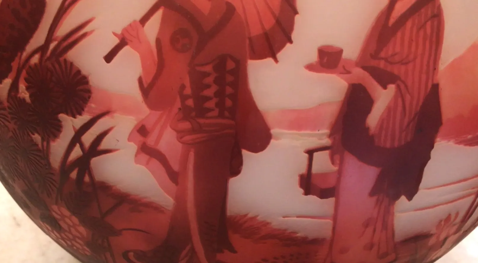 Signed glass featuring landscape and Japanese figures