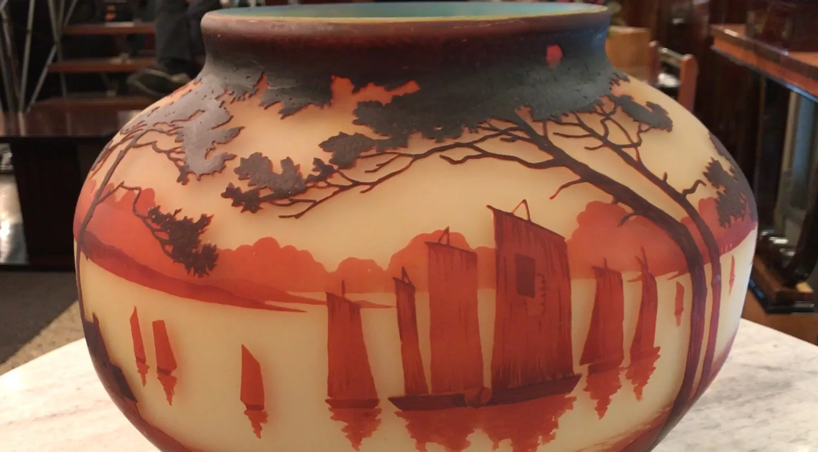 Antique signed glass by Muller Fres featuring terracotta landscape details.