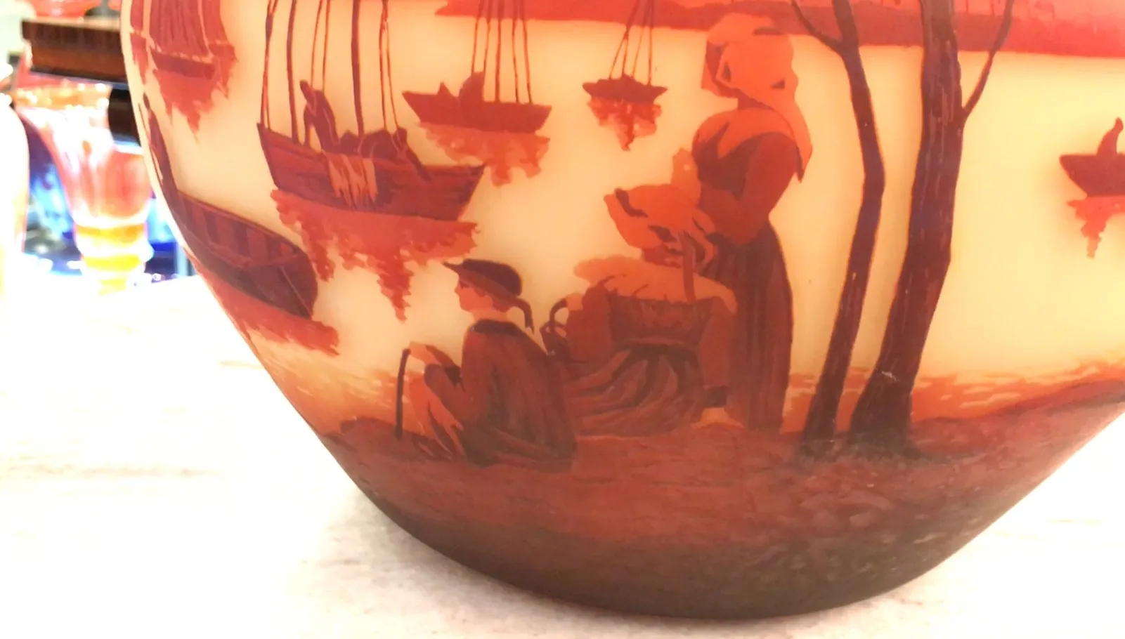 Signed glass Muller Fres featuring nature scenes and human figures in warm tones.