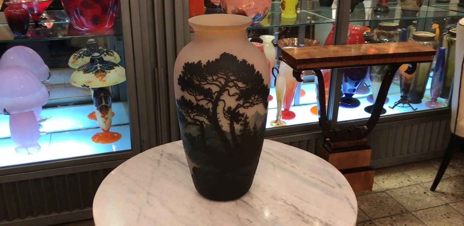 Antique vase with tree design and dark background