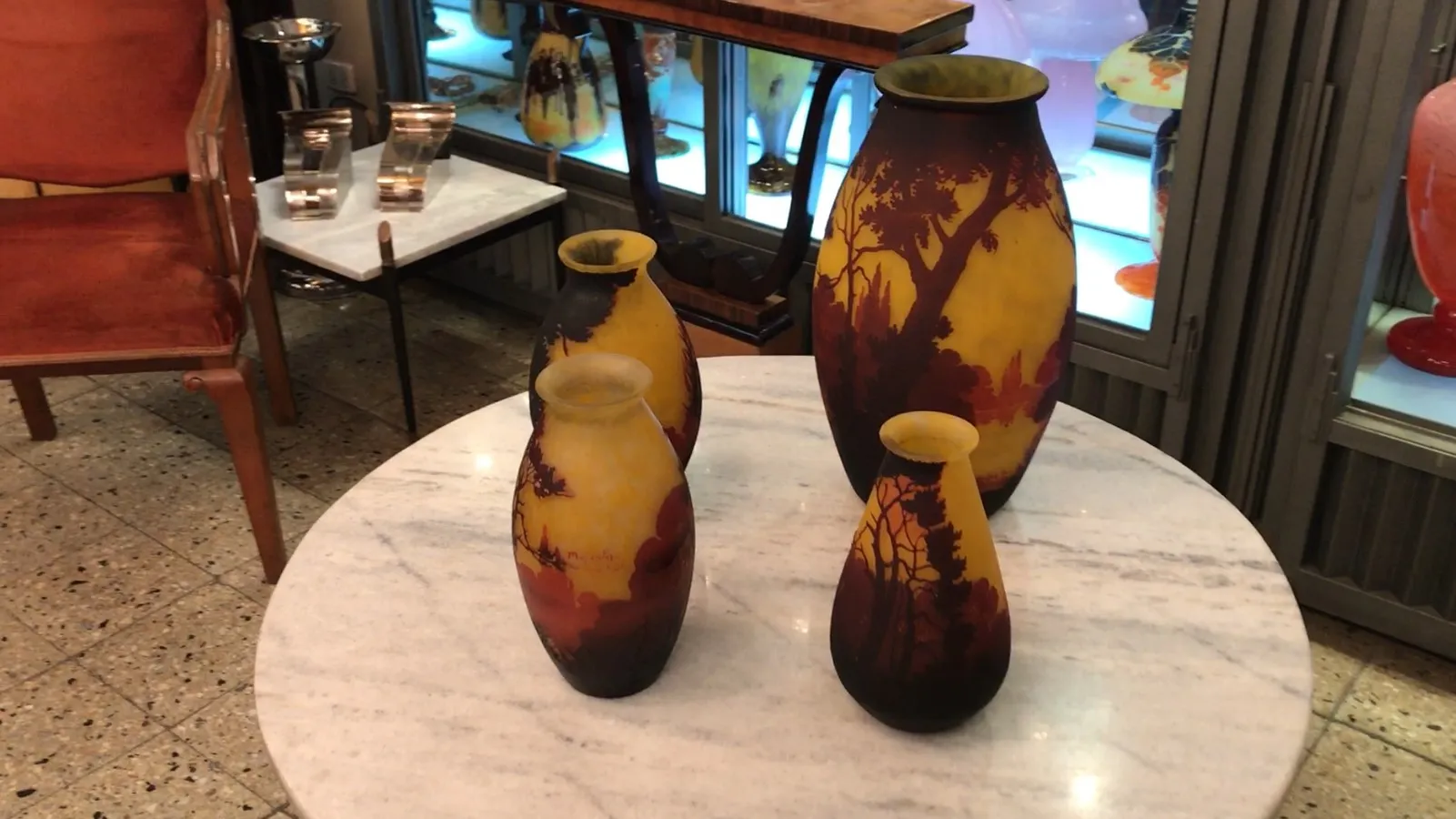 Collection of antique signed glass muller fres in vibrant colors.