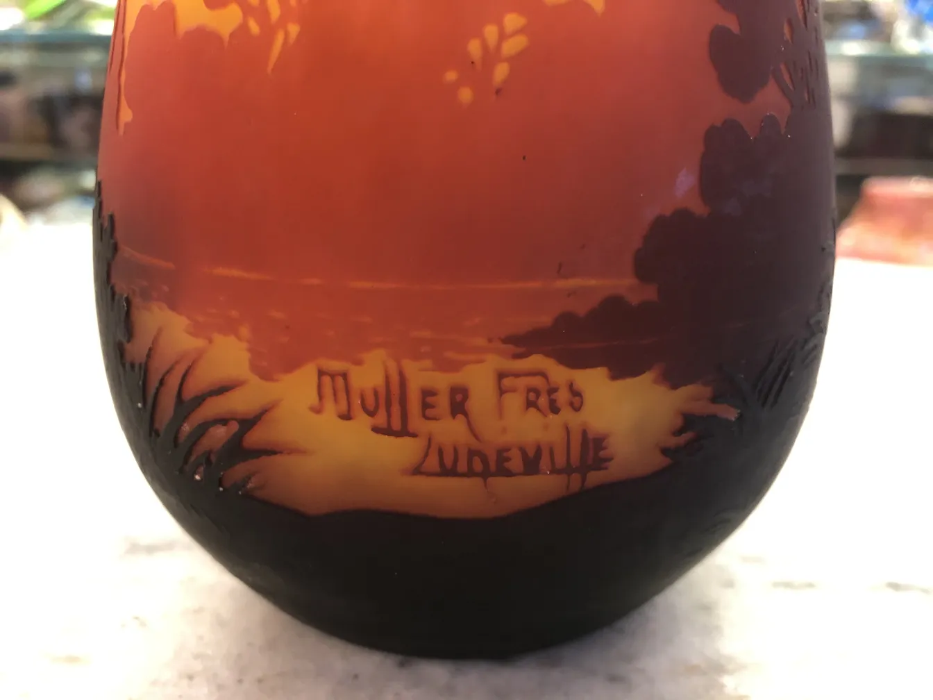 Antique signed glass by Muller Fres with engraved elements.