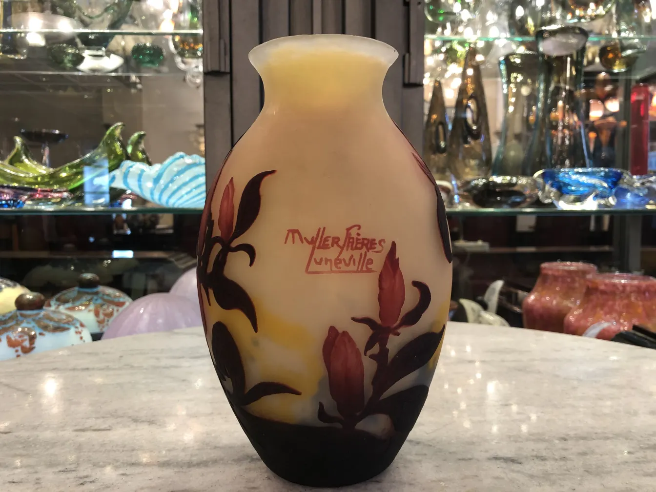 Antique vase with flowers and signature of Muller Freres.