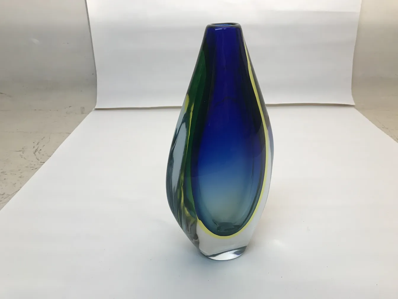 antique murano vase featuring vibrant colors in elegant shape