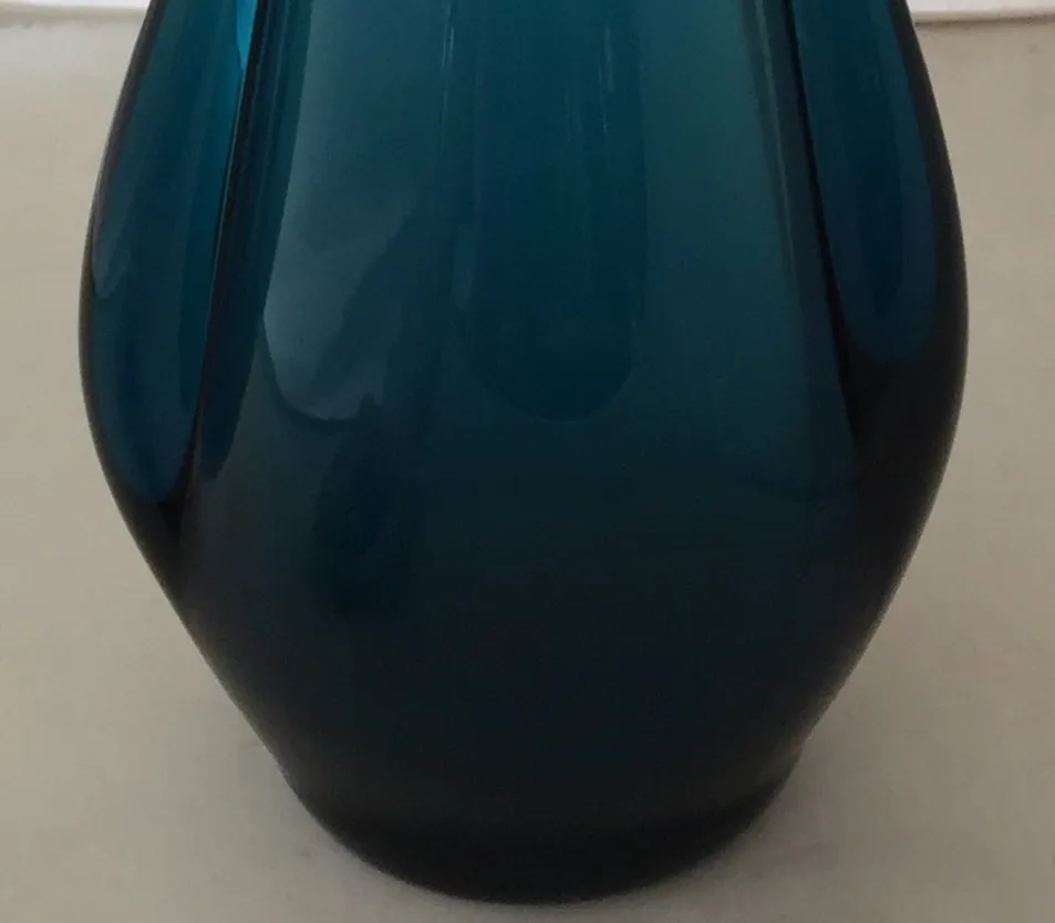 elegant blue murano vase in neutral setting
