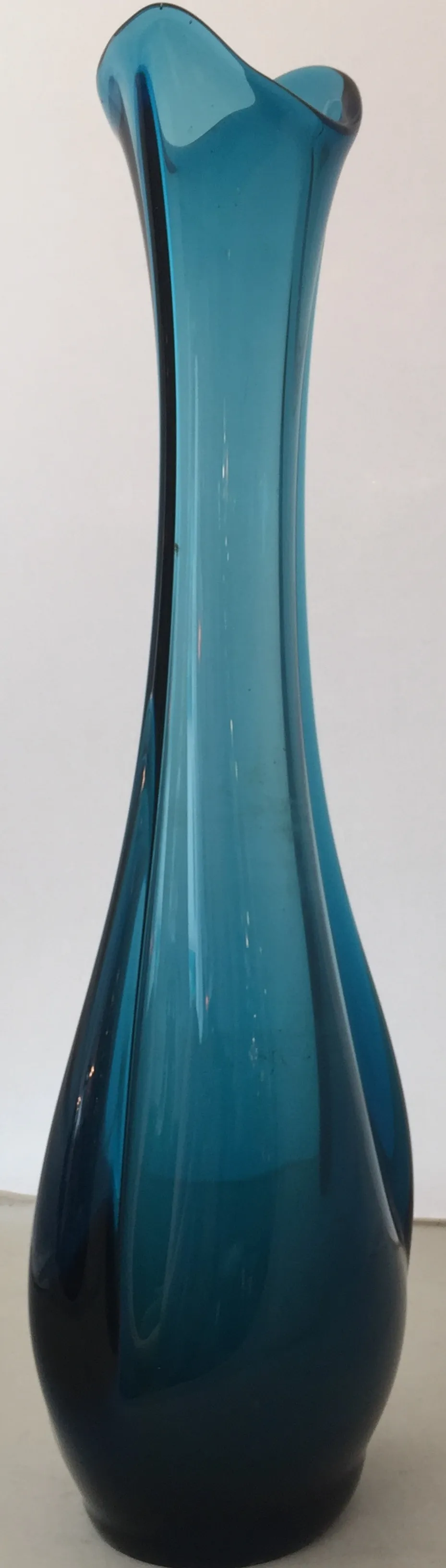 antique elegant murano vase in vibrant blue color