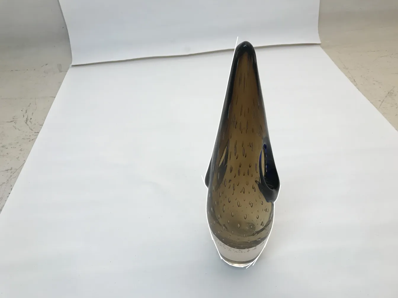 murano vase with light and dark tones, pointed shape, white background