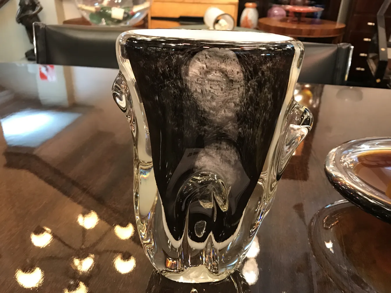 Murano vase with unique design and visible details, in an elegant setting