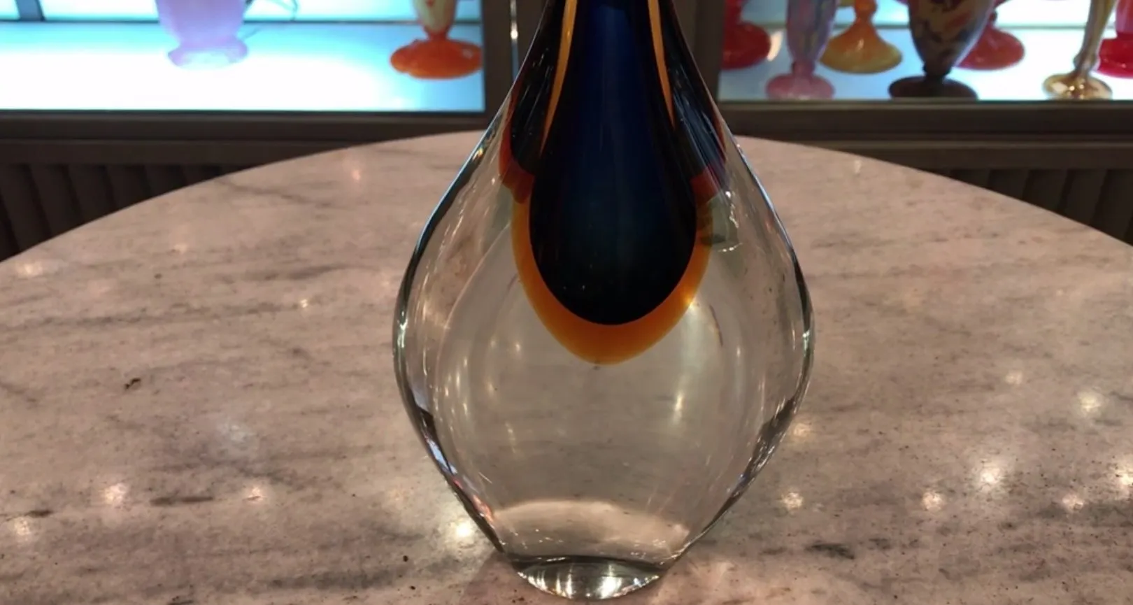 Antique Murano vase with flowing shapes and vibrant colors