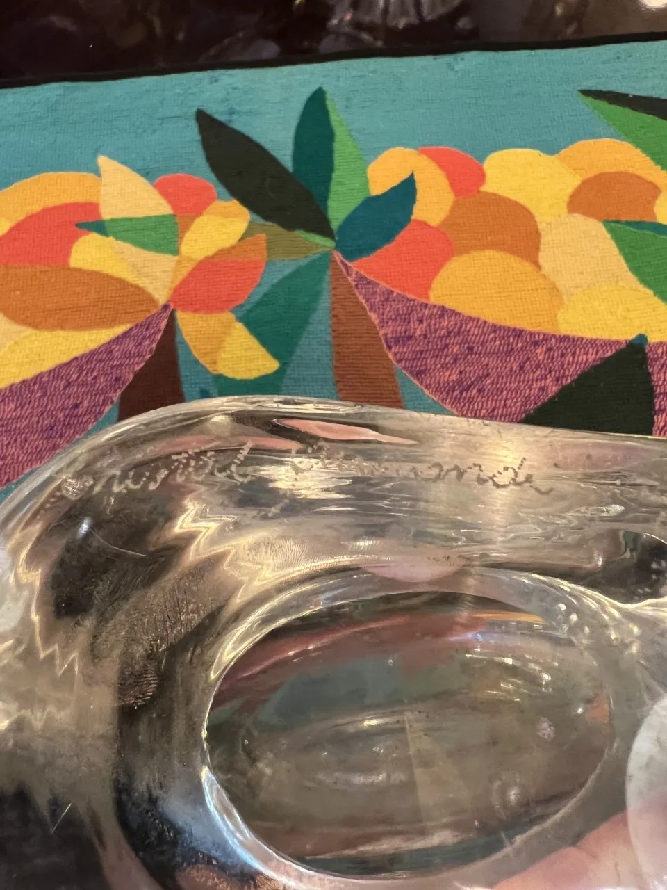 Antique Murano vase featuring decorative design in a colorful environment.