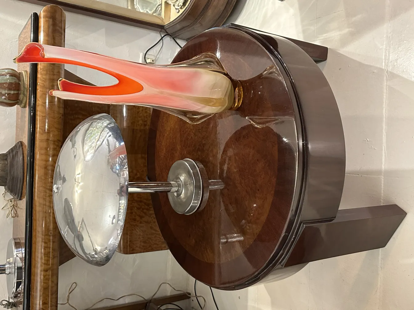 antique murano vase with orange and yellow hues on a table