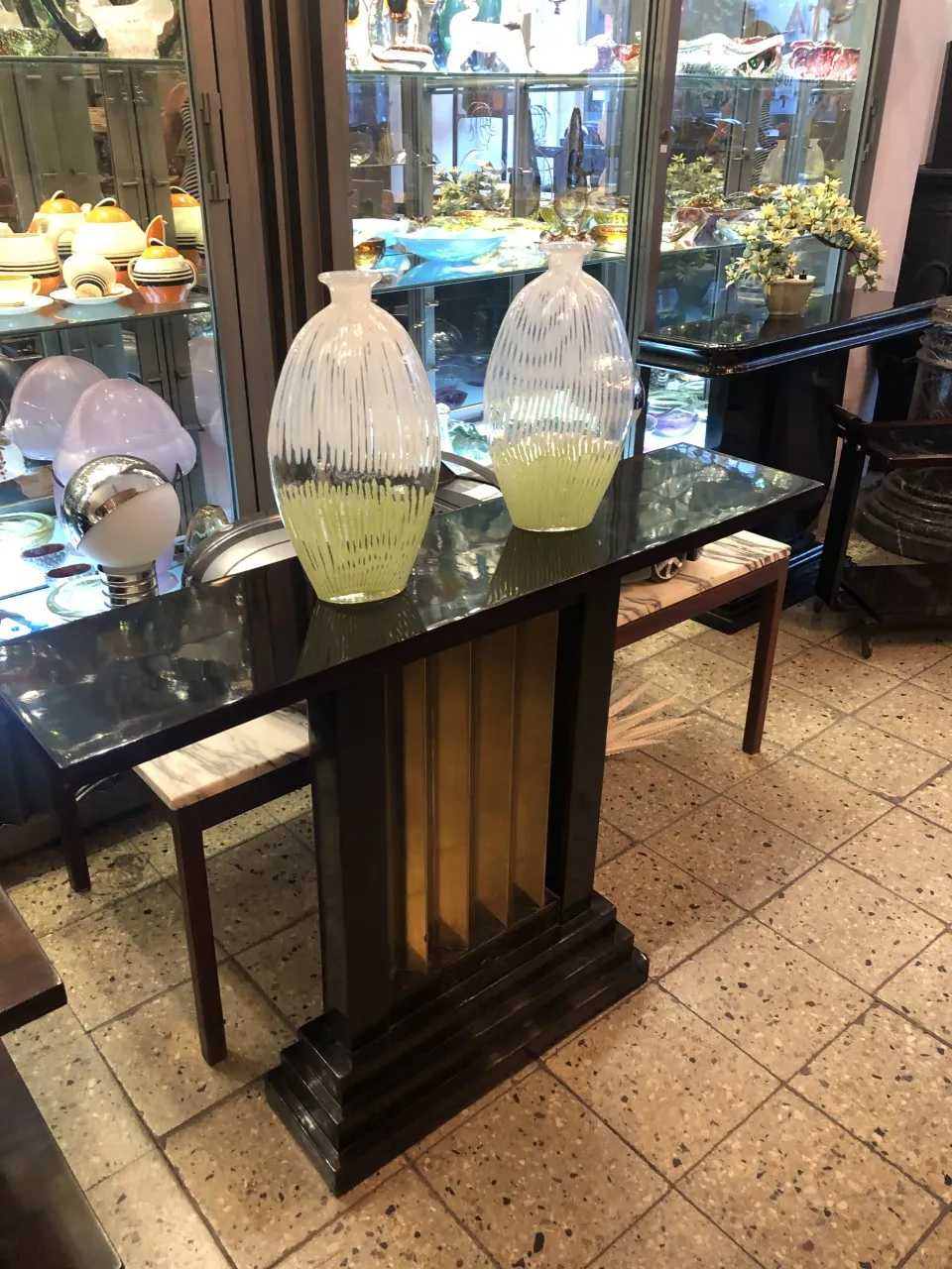 Antique Murano vase with light color details, decorative, sitting on a table