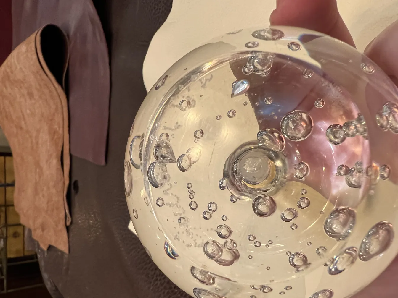 antique murano sculpture featuring a round shape and visible bubbles