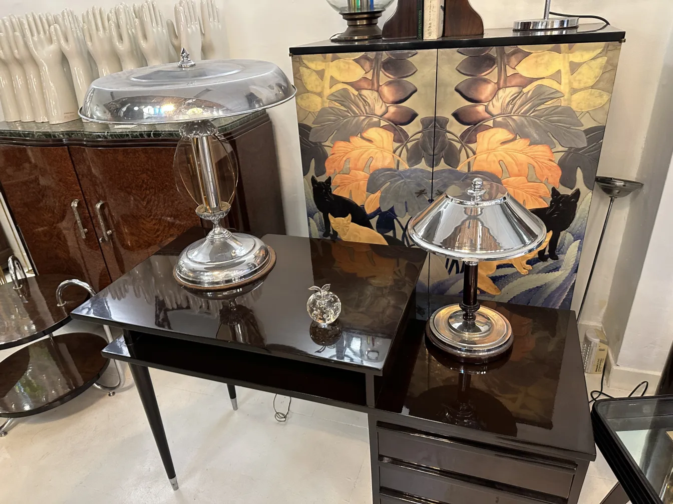 antique murano sculpture with decorative elements in background