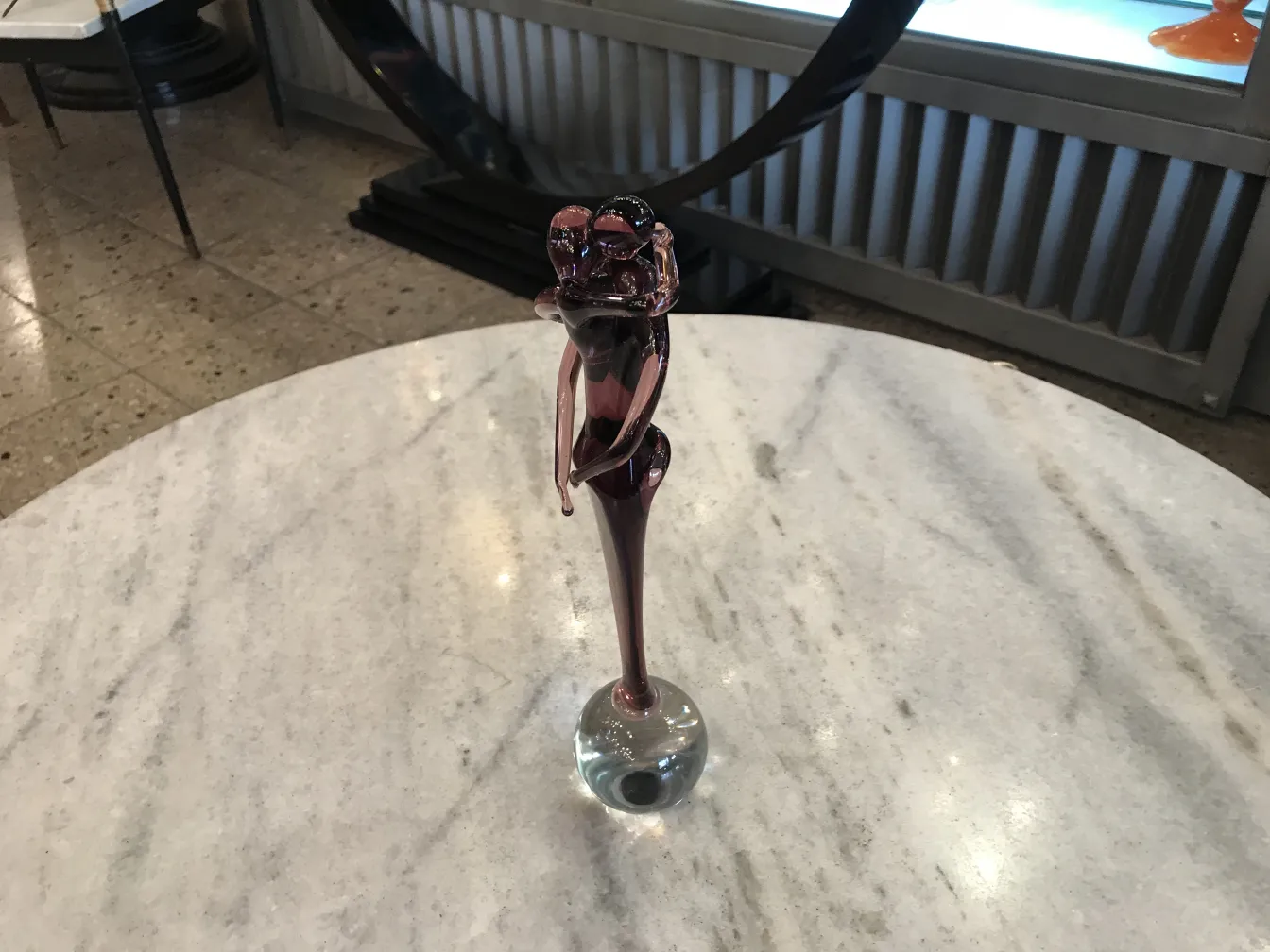 Murano sculpture in the shape of a decorative figure on a pedestal