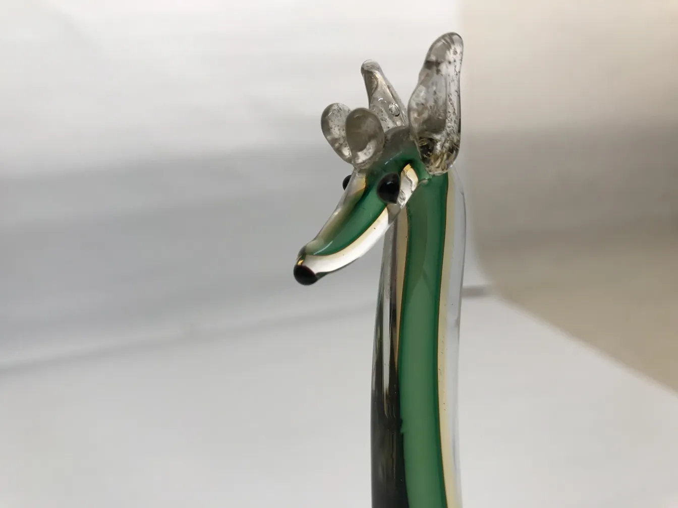 Antique Murano sculpture shaped like an animal, colorful and detailed