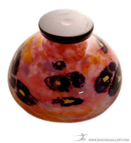 Antique signed glass Schneider featuring a colorful design in pink hues